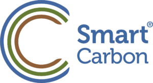 Smart Carbon logo featuring a stylised letter “C” formed by three curved bands in blue, green and brown. To the right, the words “Smart Carbon” appear in large blue text, with a registered trademark symbol in the upper-right corner. The logo uses colours associated with sustainability, nature and environmental management on a white background.